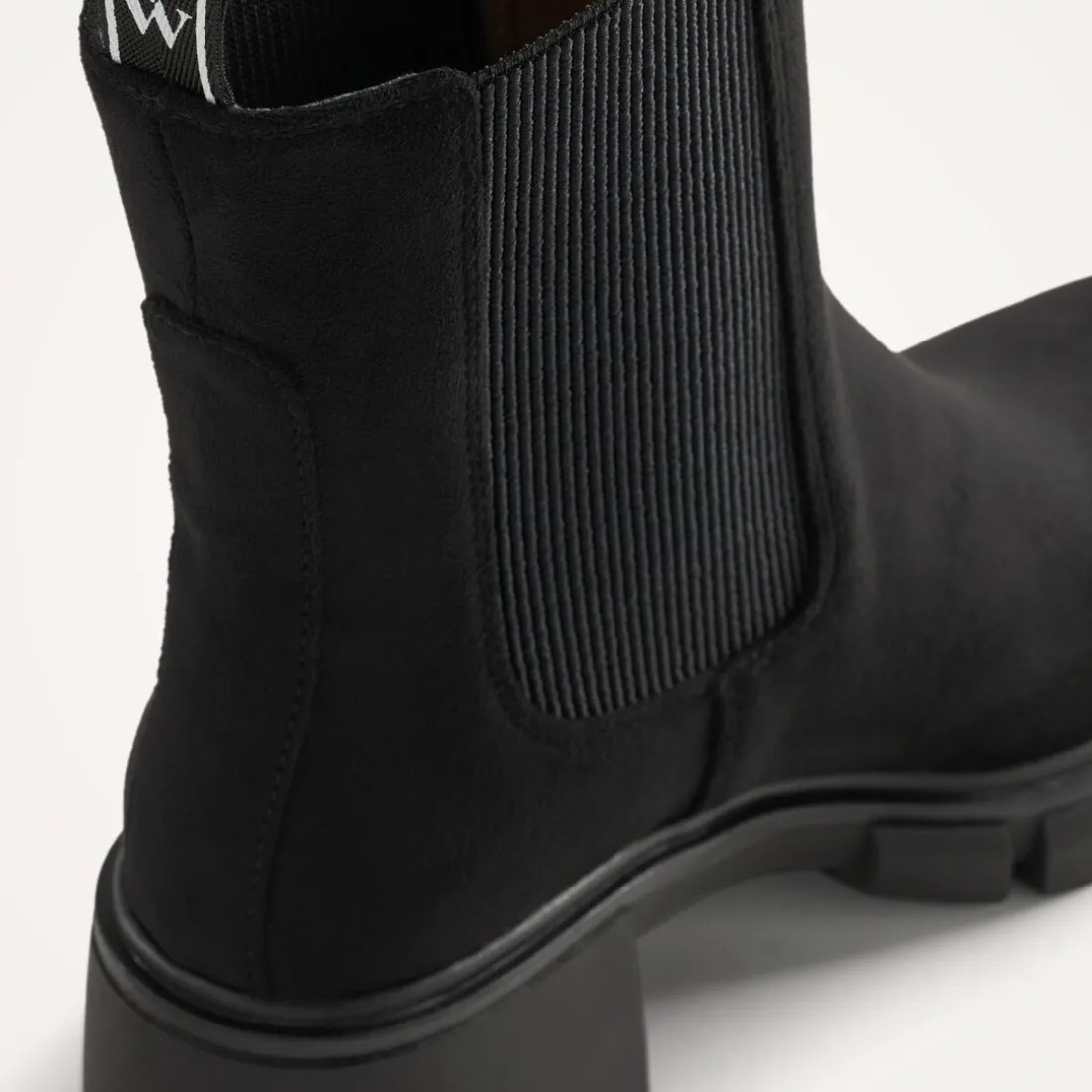 Bottines Chelsea noires à talon cranté